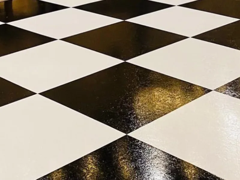Dance floor: Black and White checkerboard of 3 by 3 ft panels (Smoked Oak and Dark Maple wood also available)