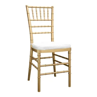 Gold Chiavari chair with ivory seat pad