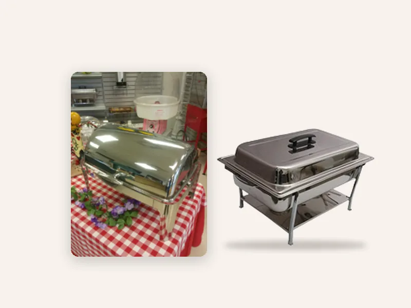 Stainless roll-top chafing dish on a buffet table next to a basic stainless chafing dish