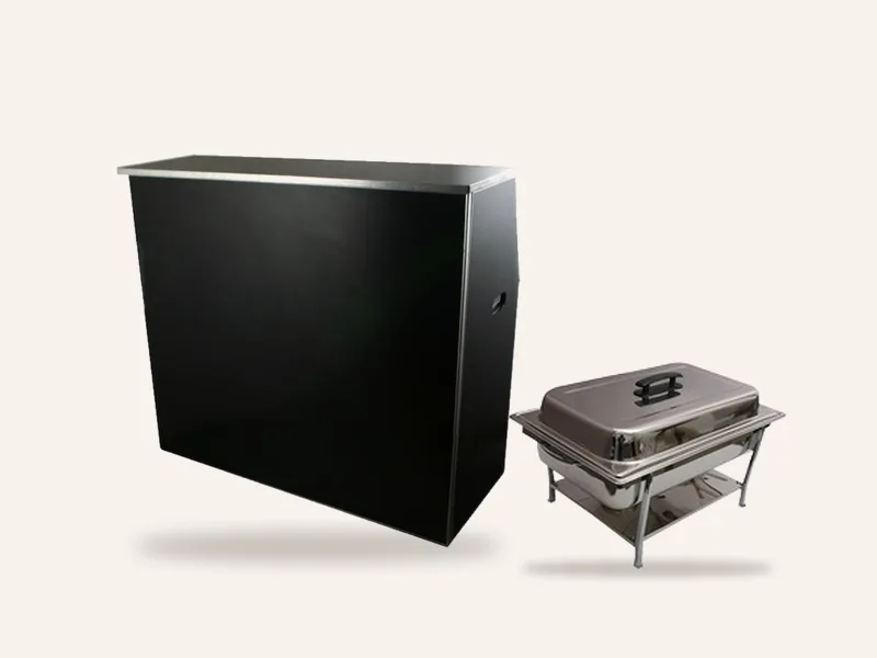 Black folding bar next to a stainless steel chafing dish