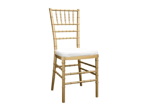 Gold Chiavari chair with ivory seat pad